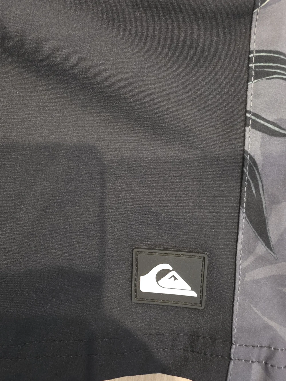 Quiksilver Black Swim Trunks with Gray Floral Side Panels